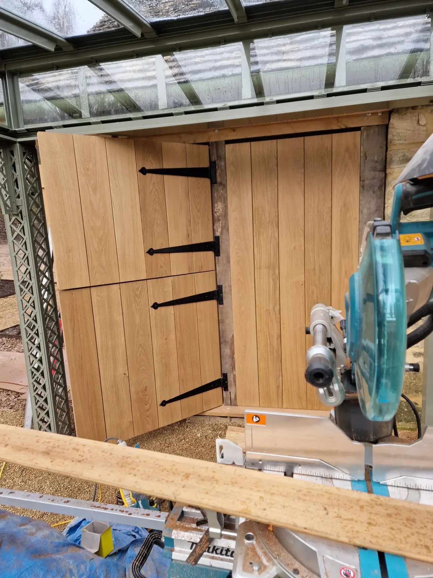 Bespoke oak doors with hand forged ironmongery